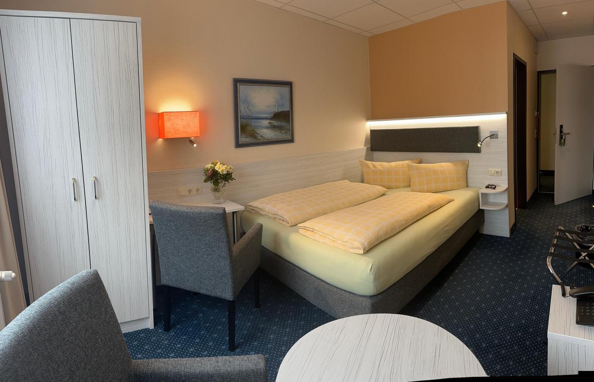 Duenenhotel Am Meer Росток Экстерьер фото