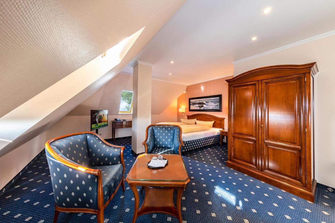 Duenenhotel Am Meer Росток Экстерьер фото